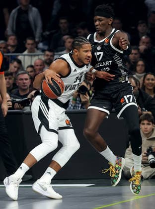 Partizan v Virtus, Euroleague, season 2025 2026, round 16 Belgrade, Serbia. 17th Dec, 2025. Virtus Bologna s Karim Jallow (L) vies with Partizan s Isaac Bonga (R) during Euroleague basketball match between Partizan and Virtus on December 17. 2025. in Belgrade, Serbia. Belgrade Serbia Copyright: xPedjaxMilosavljevic STARSPORTx
