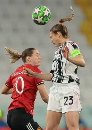 Turin, Italy, 17th December 2025. Cecilia Salvai of Juventus heads on from Elisabeth Terland of Manchester United, ManU during the Juventus Women vs Manchester United Women UEFA Womens Champions League match at Juventus Stadium, Turin. Picture credit should read: Jonathan Moscrop Sportimage EDITORIAL USE ONLY. No use with unauthorised audio, video, data, fixture lists, club league logos or live services. Online in-match use limited to 120 images, no video emulation. No use in betting, games or single club league player publications. SPI_011_JM_JUVE_MANUTD_UWCL SPI-4364-0011