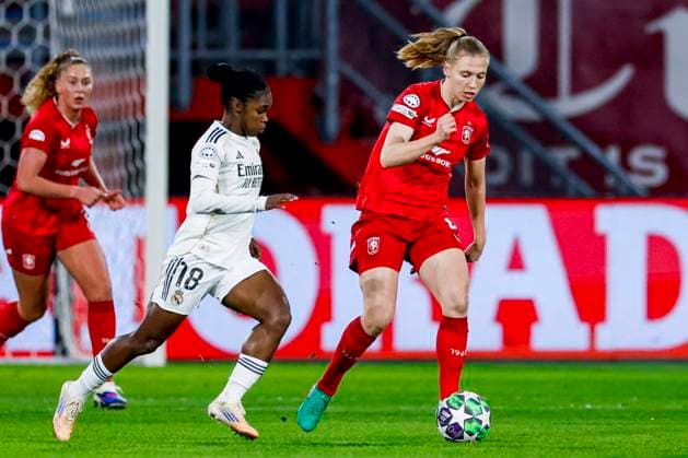 Lieske Carleer of FC Twente dribbles with the ball under pressure from Linda Caicedo of Real Madrid FC Twente v Real Madrid CF, UEFA Women s Champions League 2025 26 League Phase MD6, FC Twente v Real Madrid CF, FC Twente Stadium, December 17, 2025, Enschede, Netherlands.