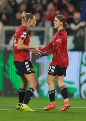 Turin, Italy, 17th December 2025. Jess Park of Manchester United, ManU celebrates with team mate Fridolina Rolfo after scoring to give the side a 1-0 lead during the Juventus Women vs Manchester United Women UEFA Womens Champions League match at Juventus Stadium, Turin. Picture credit should read: Jonathan Moscrop Sportimage EDITORIAL USE ONLY. No use with unauthorised audio, video, data, fixture lists, club league logos or live services. Online in-match use limited to 120 images, no video emulation. No use in betting, games or single club league player publications. SPI_014_JM_JUVE_MANUTD_UWCL SPI-4364-0014