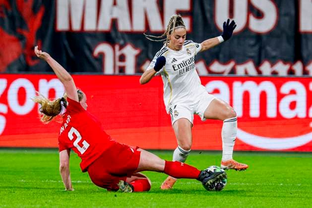 Athenea of Real Madrid and Imre van der Vegt of FC Twente battle for the ball FC Twente v Real Madrid CF, UEFA Women s Champions League 2025 26 League Phase MD6, FC Twente v Real Madrid CF, FC Twente Stadium, December 17, 2025, Enschede, Netherlands.