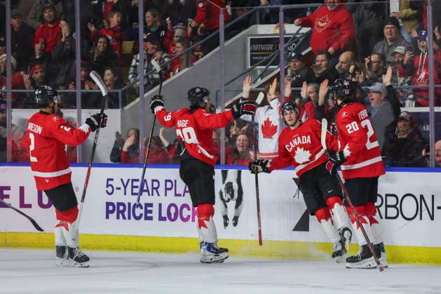 December 17, 2025, Kitchener, On, Canada: Team Canada teammates celebrate a goal against Sweden in the third period during IIHF World Junior Hockey Championship pre-tournament action in Kitchener, Ont. on Wednesday, December 17, 2025. Canada News - December 17, 2025  - ZUMAc35_ 20251217_zaf_c35_053 Copyright: xNickxIwanyshynx