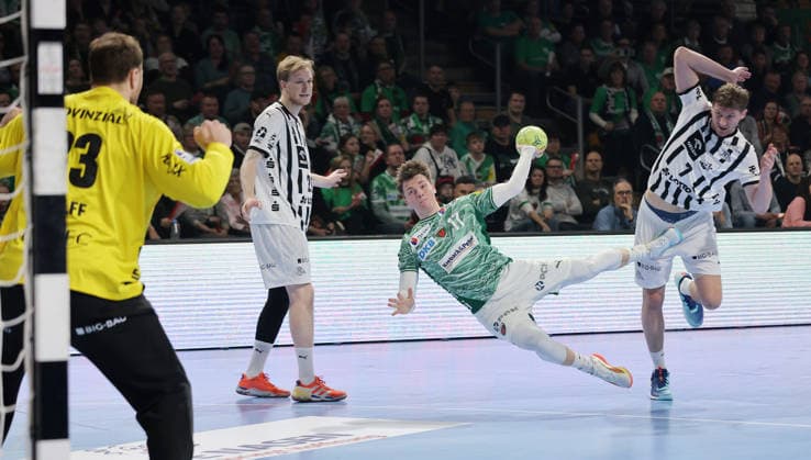 Goalkeeper Andreas Wolff, Eric Johansson, Nils Lichtlein on the ball, Magnus Landin Jacobsen duel Match scene Action Sport Handball DHB Cup quarter-final mens season 2025 2026 18 12 2025 Füchse Berlin vs THW Kiel