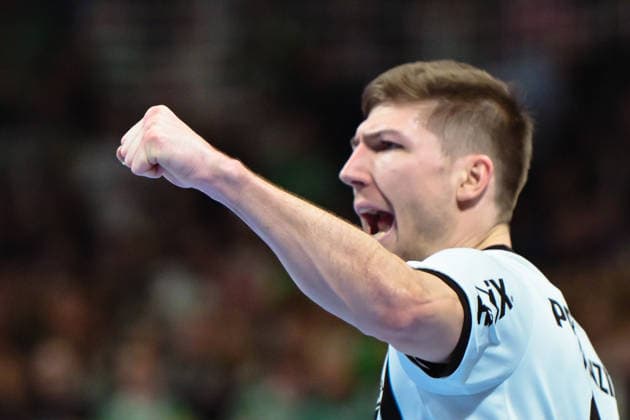 18 12 2025, xlakx, Handball DHB Pokal 1 4 Final, Fuechse Berlin THW Kiel v l Lukas Zerbe THW Kiel cheering after the goal Berlin