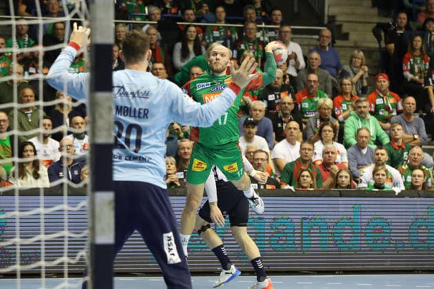 18 12 2025, xtgx, Handball, DHB Pokal Quarterfinal, SC Magdeburg SG Flensburg Handewitt v l Tim Hornke Magdeburg, 17 throws goal, Torschuetze, erzielt Tor, Treffer, scores the goal Magdeburg