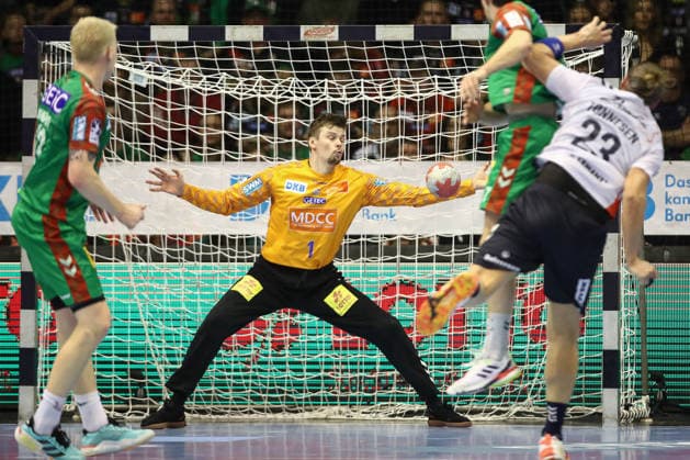 18 12 2025, xtgx, Handball, DHB Pokal quarterfinal, SC Magdeburg SG Flensburg Handewitt v l Sergey Hernandez Ferrer Magdeburg, 1 save, holds the ball, catches the ball, parries Magdeburg