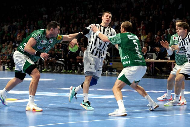 DEU, DHB, Pokal, Fuechse Berlin vs THW Kiel, 18 12 2025, Max Schmeling Halle, Berlin, DEU, DHB, Pokal, Fuechse Berlin vs THW Kiel, in the picture Max Darj Fuechse Berlin 5 , Mijajlo Marsenic Fuechse Berlin 93 , Elias Ellefsen A Skipagotu THW Kiel 71 nordphotoxGmbHx xEngler nph00076