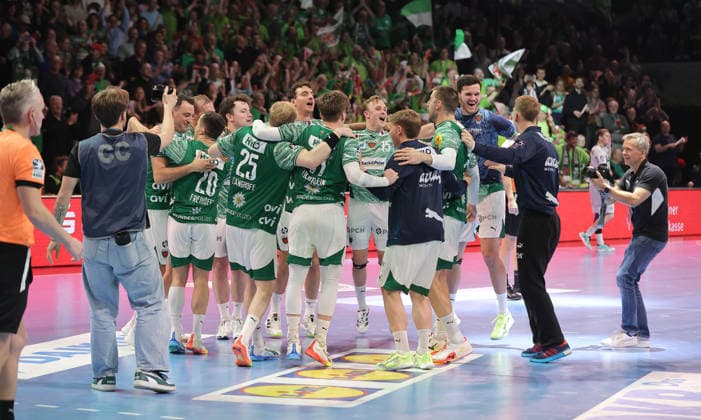 Füchse team cheers after the end of the match Joy Emotion Cheers Sport Handball DHB Cup quarter-finals mens season 2025 2026 18 12 2025 Füchse Berlin vs THW Kiel