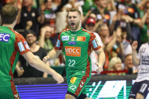 18 12 2025, xtgx, Handball, DHB Pokal quarter-final, SC Magdeburg SG Flensburg Handewitt v l Lukas Mertens Magdeburg, 22 cheers, jubilation over the goal, celebrate the goal, celebration Magdeburg