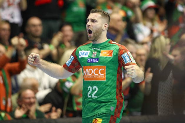 18 12 2025, xtgx, Handball, DHB Pokal quarter-final, SC Magdeburg SG Flensburg Handewitt v l Lukas Mertens Magdeburg, 22 cheers, jubilation over the goal, celebrate the goal, celebration Magdeburg