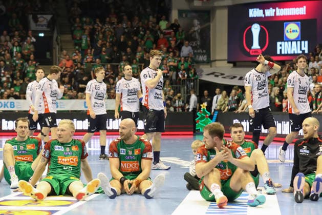 18 12 2025, xtgx, Handball, DHB Pokal quarterfinal, SC Magdeburg SG Flensburg Handewitt v l Flensburg disappointed, looks disappointed, disappointed Magdeburg