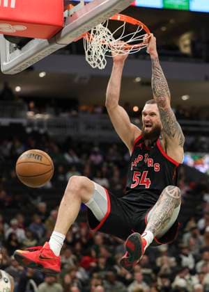 (251219) -- MILWAUKEE, Dec. 19, 2025 -- Toronto Raptors Sandro Mamukelashvili dunks during the 2025-2026 NBA, Basketball Herren, USA regular season game between Milwaukee Bucks and Toronto Raptors in Milwaukee, the United States, on Dec. 18, 2025. (Photo by Xinhua) (SP)U.S.-MILWAUKEE-BASKETBALL-NBA-BUCKS VS RAPTORS JoelxLerner 