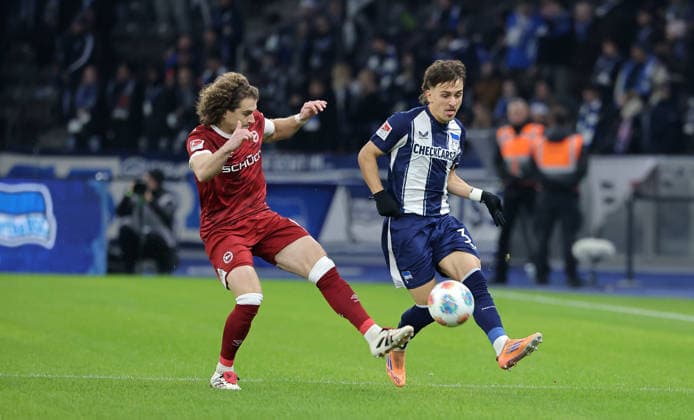 Mael Corboz, Michal Karbownik duel match scene Action Sport Football Soccer DFL 2 Bundesliga Men 17 Matchday Season 2025 2026 19 12 2025 Hertha BSC Berlin vs DSC Arminia Bielefeld DFL regulations prohibit any use of photographs as image sequences and or quasi video