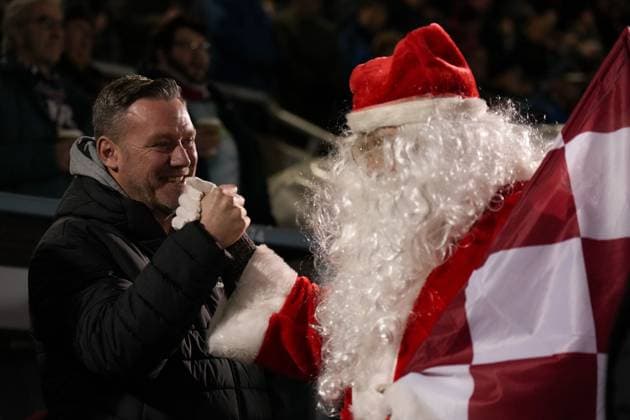 Northampton Town Manager Kevin Nolan with Father Christmas Northampton Town v AFC Wimbledon, Sky Bet League One, Football, Sixfields Stadium, Northampton, UK - 19 Dec 2025Northampton Sixfields Stadium United Kingdom EDITORIAL USE ONLY No use with unauthorised audio, video, data, fixture lists, club league logos or live services. Online in-match use limited to 120 images, no video emulation. No use in betting, games or single club league player publications.  Copyright: xJoexToth Shutterstockx 16142729k