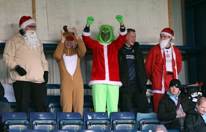 Bolton Wanderers fans in Christmas fancy dress ahead of kick off Wycombe Wanderers v Bolton Wanderers, Sky Bet League One, Football, Adams Park, High Wycombe, UK - 20 Dec 2025High Wycombe Adams Park United Kingdom EDITORIAL USE ONLY No use with unauthorised audio, video, data, fixture lists, club league logos or live services. Online in-match use limited to 120 images, no video emulation. No use in betting, games or single club league player publications.  Copyright: xKieranxMcManus Shutterstockx 16148992bb