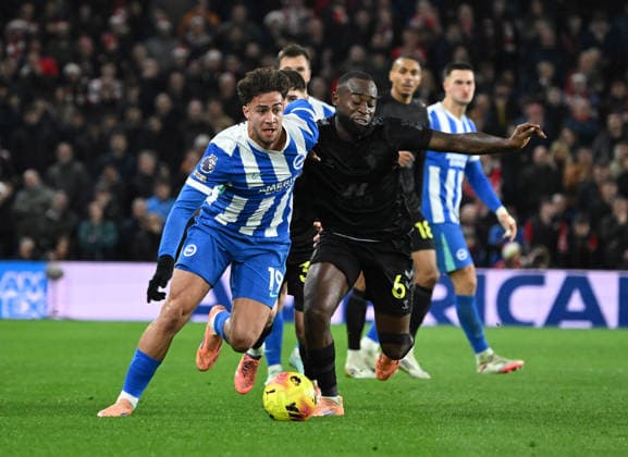 Charalampos Kostoulas of Brighton tries to find a way past Lutsharel Geertruida of Sunderland during the Premier League match between Brighton and Hove Albion and Sunderland at the American Express Stadium, Brighton UK - Saturday 20th December 2025 Brighton v Sunderland Premier League Football, Amex Stadium, Sussex, UK - 20 Dec 2025Brighton Amex Stadium Sussex United Kingdom Editorial use only. No merchandising. For Football images FA and Premier League restrictions apply inc. no internet mobile usage without FAPL license - for details contact Football Dataco  Copyright: xLizxFinlayson TPI Shutterstockx 16159610ax