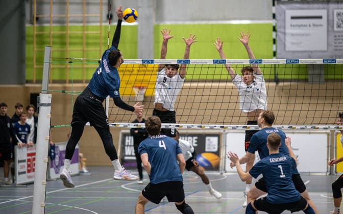 Volleyball, Season 2025 2026, 2 Bundesliga Bord, 20 12 2025, 12 Matchday, Men, TuB Bocholt white vs PSV Neustrelitz grey v l Stephanos Haridimou PSV Neustrelitz, on the ground , Fiete Kramer PSV Neustrelitz , Lukas Salimi TuB Bocholt , Tom Doerpinghaus TuB Bocholt , Jannik Buehler PSV Neustrelitz , Jesco Genzmer PSV Neustrelitz , Bocholt Sporthalle West Nordrhein Westfalen Germany 251220_vb_tub-bocholt_psv-neustrelitz_47914