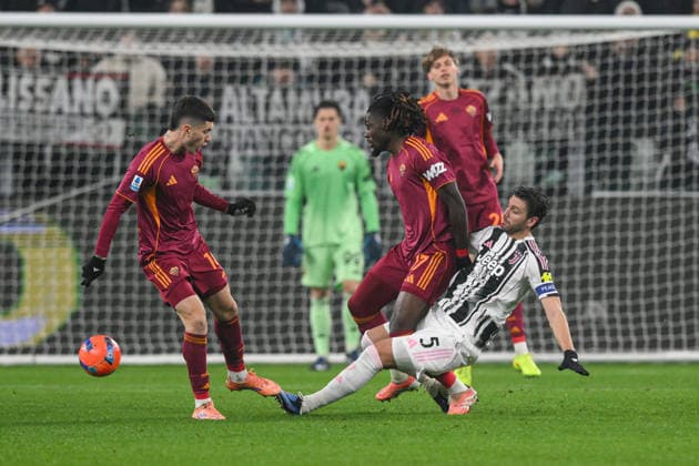 20th December 2025, Allianz Stadium, Turin, Italy; Serie AFootball; Juventus versus Roma; Manu Kone of AS Roma under pressure from Manuel Locatelli of FC Juventus  AllShotxLive