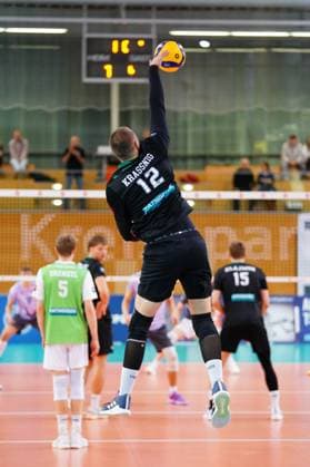 Noel Simon Jakob Krassnig 12 TSV Haching Munich smashes, while Florian Krenkel 5 TSV Haching Munich and Jakub Klajmon 15 TSV Haching Munich block Noel Simon Jakob Krassnig 12 TSV Haching Munich smashes at the net Copyright: xspeedshotx