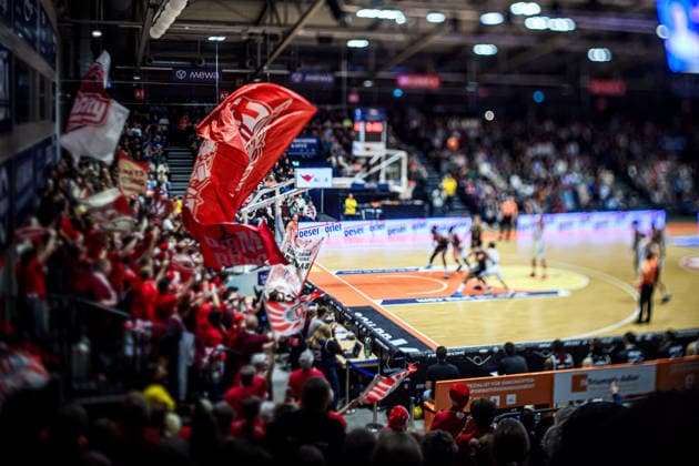 easycredit BBL Basketball Bundesliga 2025 2026 11 Matchday 20 12 2025 Science City Jena vs BMA365 Bamberg Baskets Numerous Bamberg fans cheer on their team Tilt Shift Admission Sparkassen Arena