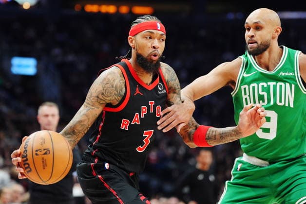 December 20, 2025, Toronto, On: Toronto Raptors Brandon Ingram (3) protects the ball from Boston Celtics Derrick White (9) during first half NBA, Basketball Herren, USA basketball action in Toronto on Saturday, Dec. 20, 2025. Canada News - December 20, 2025  - ZUMAc35_ 20251220_zaf_c35_041 Copyright: xFrankxGunnx