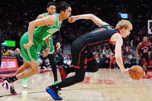 December 20, 2025, Toronto, On: Toronto Raptors Gradey Dick (right) steals the ball from Boston Celtics Josh Minott (8) during first half NBA, Basketball Herren, USA basketball action in Toronto on Saturday, Dec. 20, 2025. Canada News - December 20, 2025  - ZUMAc35_ 20251220_zaf_c35_042 Copyright: xFrankxGunnx