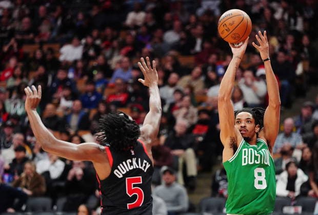 December 20, 2025, Toronto, On: Boston Celtics Josh Minott (8) shoots over Toronto Raptors Immanuel Quickley (5) during first half NBA, Basketball Herren, USA basketball action in Toronto on Saturday, Dec. 20, 2025. Canada News - December 20, 2025  - ZUMAc35_ 20251220_zaf_c35_059 Copyright: xFrankxGunnx