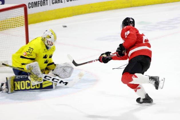 December 20, 2025, London, On, Canada: Canada forward Brady Martin (28) takes a shot on Sweden goaltender Love Harenstam (30) during the second period of a IIHF World Junior Hockey Championship pre-tournament game in London, Ont., Saturday, December 20, 2025. Canada News - December 20, 2025  - ZUMAc35_ 20251220_zaf_c35_068 Copyright: xNicolexOsbornex