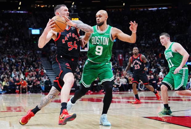 December 20, 2025, Toronto, On: Toronto Raptors Sandro Mamukelashvili (54) drives as Boston Celtics Derrick White (9) defends during first half NBA, Basketball Herren, USA basketball action in Toronto on Saturday, Dec. 20, 2025. Canada News - December 20, 2025  - ZUMAc35_ 20251220_zaf_c35_075 Copyright: xFrankxGunnx