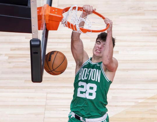 (251221) -- TORONTO, Dec. 21, 2025 -- Hugo Gonzalez of Boston Celtics dunks during the 2025-2026 NBA, Basketball Herren, USA regular season game between Toronto Raptors and Boston Celtics in Toronto, Canada, on Dec. 20, 2025. ) (SP)CANADA-TORONTO-NBA-CELTICS VS RAPTORS ZouxZheng 