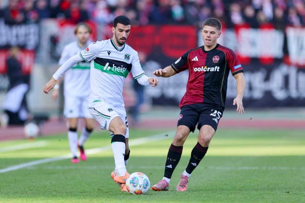 Waniss Taibi Hannover 96 and Finn Becker 1 FC Nuernberg battle for the ball, 2 Bundesliga, 1 FC Nürnberg v Hannover 96, Max Morlock Stadion on December 21, 2025 in Nuremberg, Germany Photo by Marco Steinbrenner DeFodi Images Waniss Taibi Hannover 96 and Finn Becker 1 FC Nuernberg battle for the ball, 2 Bundesliga, 1 FC Nürnberg v Hannover 96, Max Morlock Stadion, December 21, 2025 in Nuremberg, Germany Photo by Marco Steinbrenner DeFodi Images