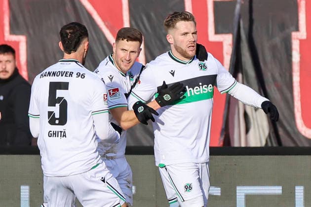 Benjamin Kaellmann Hannover 96 celebrates after scoring his teams first goal with Virgil Ghita Hannover 96 and Enzo Leopold Hannover 96 , 2 Bundesliga, 1 FC Nürnberg v Hannover 96, Max Morlock Stadion on December 21, 2025 in Nuremberg, Germany Photo by Marco Steinbrenner DeFodi Images Benjamin Kaellmann Hannover 96 celebrates after scoring his teams first goal with Virgil Ghita Hannover 96 and Enzo Leopold Hannover 96 , 2 Bundesliga, 1 FC Nürnberg v Hannover 96, Max Morlock Stadion, December 21, 2025 in Nuremberg, Germany Photo by Marco Steinbrenner DeFodi Images
