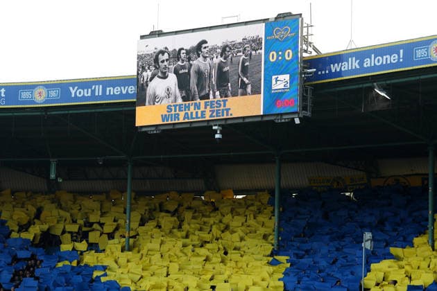 Braunschweig vs Schalke 04, 2 BL Braunschweig, 21 12 2025, FOOTBALL Eintracht Braunschweig vs FC Schalke 04, 2 BL, Season 2025 26 Eintracht Braunschweig Fankurve, A choreography was performed to mark the 130th anniversary of the founding of Braunschweig