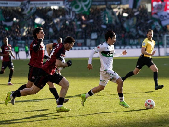 Germany Football, 2 Bundesliga 2025 26, 17 Matchday 1 FC Nuremberg vs Hannover 96 Max Morlock Stadion Nuremberg Daisuke Yokota Hannover 96, 18 Luka Lochoshvili 1 FC Nuremberg, 24 Tom Baack 1 FC Nuremberg, 5 Copyright: xChristopherxRupprechtx