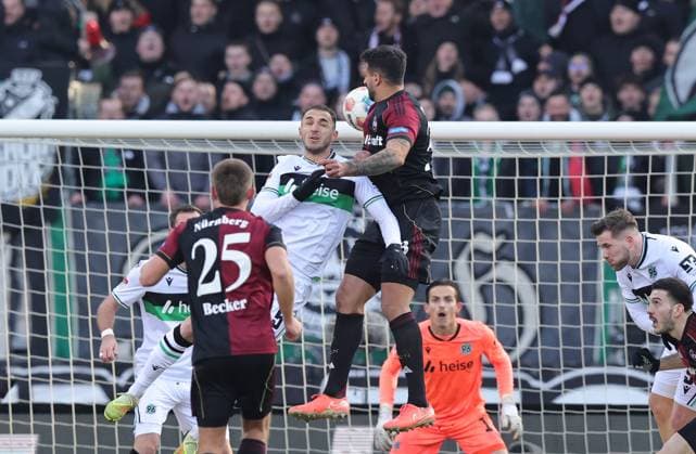 21 12 2025 Soccer Season 2025 2026 2 Soccer Bundesliga 17 Matchday 1 FC Nürnberg FCN Club Hannover 96 H96 Sportfoto Zink DaMa xdaxmax DFL regulations prohibit any use of photographs as image sequences and or quasi video only for editorial use Virgil Ghita 5, Hannover 96 H96 in header duel with Adriano Grimaldi 33, 1 FC Nürnberg FCN