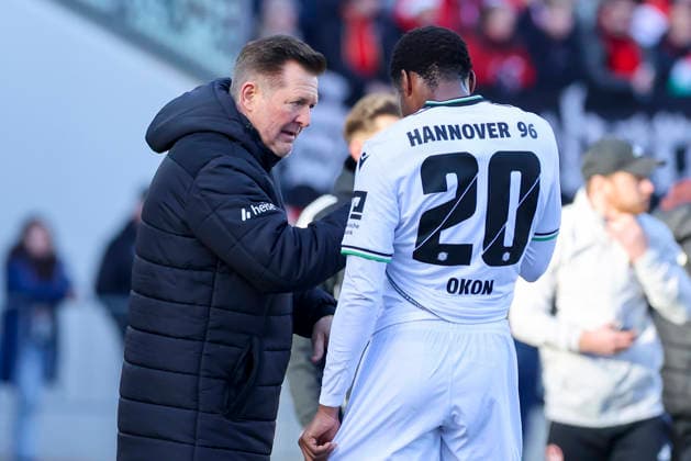 Coach Christian Titz Hannover 96 and Ime Okon Hannover 96 talk together, 2 Bundesliga, 1 FC Nürnberg v Hannover 96, Max Morlock Stadion on December 21, 2025 in Nuremberg, Germany Photo by Marco Steinbrenner DeFodi Images Coach Christian Titz Hannover 96 and Ime Okon Hannover 96 talk together, 2 Bundesliga, 1 FC Nürnberg v Hannover 96, Max Morlock Stadion, December 21, 2025 in Nuremberg, Germany Photo by Marco Steinbrenner DeFodi Images