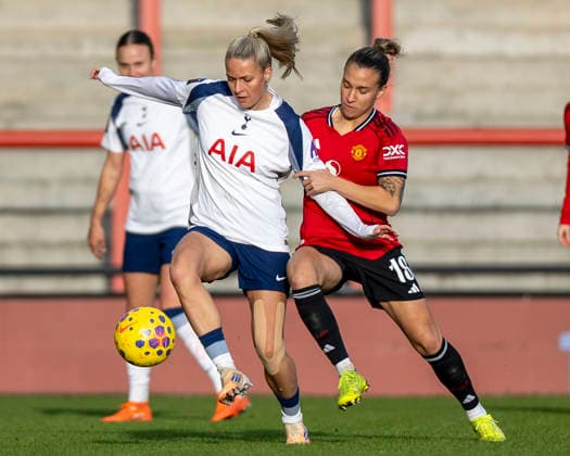 21st December 2025; Leigh Sports Village, Manchester, England; Womens League Cup Football Quarter Final, Manchester United, ManU versus Tottenham Hotspur; Olivia Holdt of Tottenham Hotspur Women is tackled by Julia Zigiotti Olme of Manchester United Women  TimxWilliams