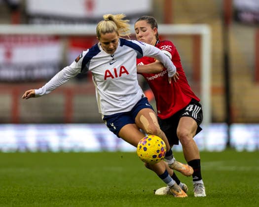 21st December 2025; Leigh Sports Village, Manchester, England; Womens League Cup Football Quarter Final, Manchester United, ManU versus Tottenham Hotspur; Olivia Holdt of Tottenham Hotspur Women is tackled by Maya Le Tissier of Manchester United Women  TimxWilliams