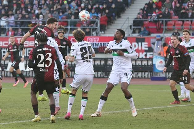 21 12 2025 Soccer Season 2025 2026 2 Soccer Bundesliga 17 Matchday 1 FC Nürnberg FCN Club Hannover 96 H96 Sportfoto Zink DaMa xdaxmax DFL regulations prohibit any use of photographs as image sequences and or quasi video only for editorial use Luka Lochoshvili 24, 1 FC Nürnberg FCN with header