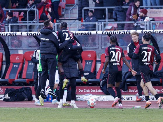 Germany Soccer, 2 Bundesliga 2025 26, 17 Matchday 1 FC Nürnberg vs Hannover 96 Max Morlock Stadion Nürnberg Goal celebration for 2 1 Mohamed Ali Zoma 1 FC Nürnberg, 23 Pape Demba Diop 1 FC Nürnberg, 20 Berkay Yilmaz 1 FC Nürnberg, 21 Copyright: xChristopherxRupprechtx
