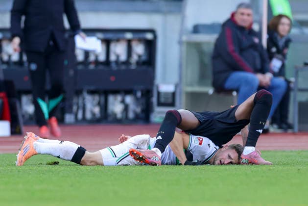 Enzo Leopold Hannover 96 and Pape Demba Diop 1 FC Nuernberg battle for the ball, 2 Bundesliga, 1 FC Nürnberg v Hannover 96, Max Morlock Stadion on December 21, 2025 in Nuremberg, Germany Photo by Marco Steinbrenner DeFodi Images Enzo Leopold Hannover 96 and Pape Demba Diop 1 FC Nuernberg battle for the ball, 2 Bundesliga, 1 FC Nürnberg v Hannover 96, Max Morlock Stadion, December 21, 2025 in Nuremberg, Germany Photo by Marco Steinbrenner DeFodi Images