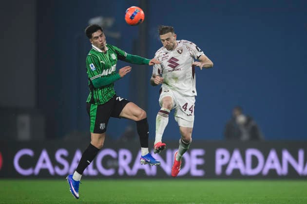 US Sassuolo v Torino FC - Serie A Ardian Ismajli of Torino FC comeptes for a header with Luca Moro of US Sassuolo during the Serie A football match between US Sassuolo and Torino FC. Reggio Emilia Italy Copyright: xNicolòxCampox