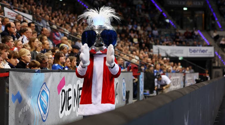 BAU 21 12 2025 Stuttgart Handball TVB Stuttgart vs VfL Gummersbach, mascot Johnnx Blue in Christmas outfit