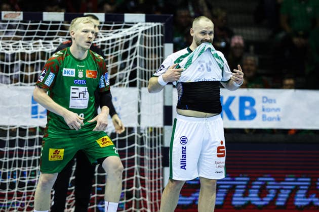 Moritz Preuss SC DHfK Leipzig,24 and Magnus Saugstrup SC Magdeburg,23 Handball Bundesliga Season 2025 2026 SC Magdeburg vs SC DHFK Leipzig at the GETEC Arena in Magdeburg Action,Handball,Germany,21 12 2025