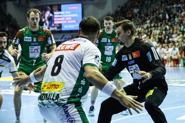 Goalkeeper Sergey Hernandez Ferrer SC Magdeburg,1 vs Lucas Krzikalla SC DHfK Leipzig,8 Handball Bundesliga Season 2025 2026 SC Magdeburg vs SC DHFK Leipzig at the GETEC Arena in Magdeburg Action,Handball,Germany,21 12 2025