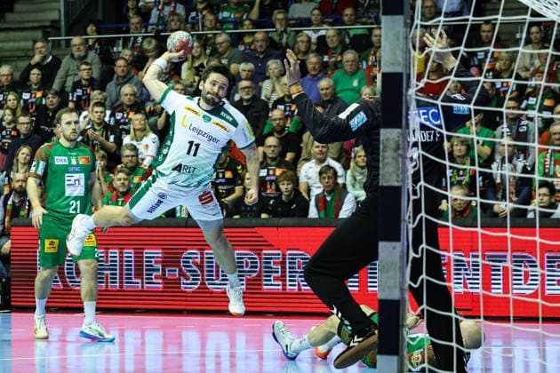 Lukas Binder SC DHfK Leipzig,11 vs Goalkeeper Sergey Hernandez Ferrer SC Magdeburg,1 Handball Bundesliga Season 2025 2026 SC Magdeburg vs SC DHFK Leipzig at the GETEC Arena in Magdeburg Action,Handball,Germany,21 12 2025