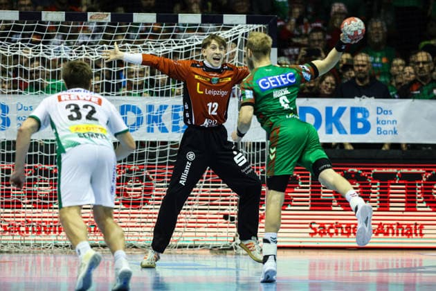 Goalkeeper Leopold Huber SC DHfK Leipzig,12 vs Matthias Musche SC Magdeburg,6 Handball Bundesliga Season 2025 2026 SC Magdeburg vs SC DHFK Leipzig at the GETEC Arena in Magdeburg Action,Handball,Germany,21 12 2025