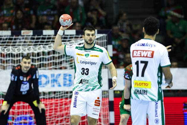Luka Rogan l ,SC DHfK Leipzig,33 and Ahmed Khairi SC DHfK Leipzig,17 Handball Bundesliga Season 2025 2026 SC Magdeburg vs SC DHFK Leipzig at the GETEC Arena in Magdeburg Action,Handball,Germany,21 12 2025