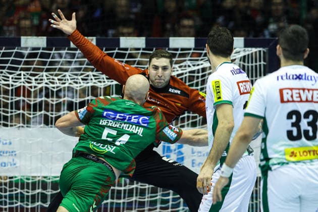 Goalkeeper Domenico Ebner SC DHfK Leipzig,1 vs Oscar Bergendahl SC Magdeburg,54 Handball Bundesliga Season 2025 2026 SC Magdeburg vs SC DHFK Leipzig at the GETEC Arena in Magdeburg Action,Handball,Germany,21 12 2025