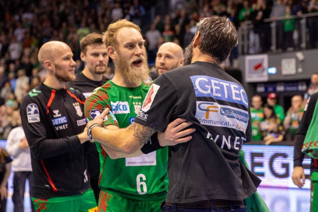 21 12 2025, xgox, Handball Daikin HBL SC Magdeburg SC DHfK Leipzig emspor, f l Bennet Wiegert Magdeburg, coach and Matthias Musche Magdeburg, 6 Cheering about the victory, cheering after the end of the game Magdeburg